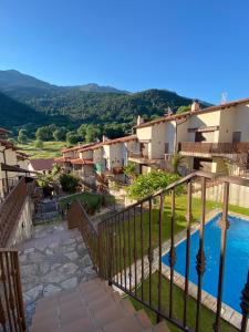 a view of a resort with a swimming pool at El Ático de Mijares in Mijares