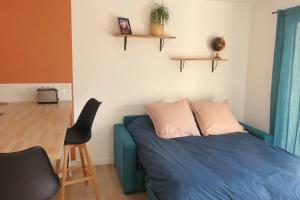 Postel nebo postele na pokoji v ubytování Néo Cévenols Hostel