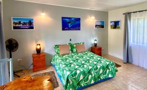 Кровать или кровати в номере Kahina Lodge
