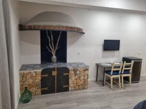 Kuchyň nebo kuchyňský kout v ubytování Rooms and Apartment Feral