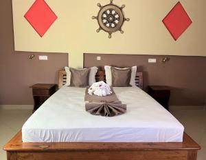Postel nebo postele na pokoji v ubytování Amazone Hotel Tulear