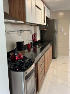 Dapur atau dapur kecil di Apartamento Encantador Centro Santa Teresa