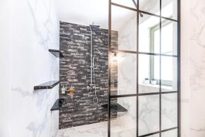 A bathroom at The Old Court Council Luxury mansion by Ifigeneia