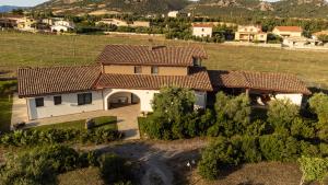 an aerial view of a house in a field at Agriturismo Sa Scalitta in Carbonia