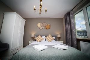 Katil atau katil-katil dalam bilik di Exquisite 3 room apartment in the heart of thetown