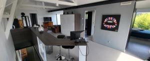 Telewizja i/lub zestaw kina domowego w obiekcie VILLA INATTENDUE
