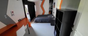 Łóżko lub łóżka w pokoju w obiekcie VILLA INATTENDUE