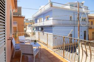 A balcony or terrace at Endless Summer Apartment