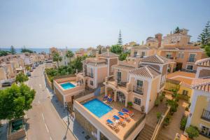an aerial view of a villa with a swimming pool at Villa Reyes in Nerja