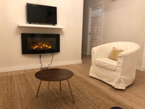 TV a/nebo společenská místnost v ubytování La Casita de El Montan Baja