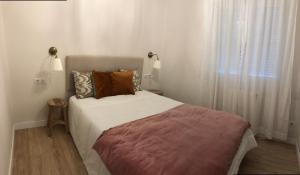 Un pat sau paturi într-o cameră la La casita de El Montan Baja