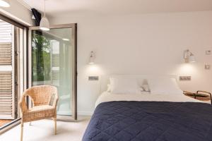 Posteľ alebo postele v izbe v ubytovaní A Casa do Souto, Santiago de Compostela + 37 fotografií
