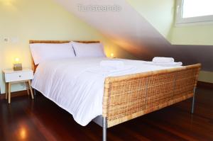 Ein Bett oder Betten in einem Zimmer der Unterkunft Rincón del Cantábrico: para amantes de las buenas vistas