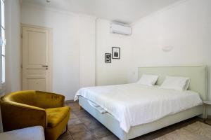 Ένα ή περισσότερα κρεβάτια σε δωμάτιο στο VILLA AMPHITRITE, SAINT TROPEZ