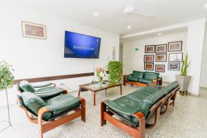 TV a/nebo společenská místnost v ubytování Hotel Las Molas