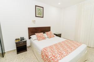 Postel nebo postele na pokoji v ubytování Hotel Las Molas