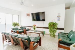 TV a/nebo společenská místnost v ubytování Hotel Las Molas