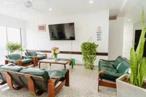 TV a/nebo společenská místnost v ubytování Hotel Las Molas
