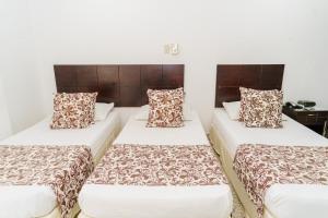 Postel nebo postele na pokoji v ubytování Hotel Las Molas