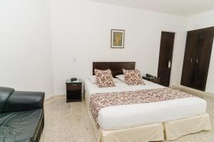 Postel nebo postele na pokoji v ubytování Hotel Las Molas