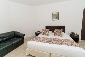 Postel nebo postele na pokoji v ubytování Hotel Las Molas