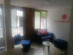 Posezení v ubytování Bienvenido a tu segundo hogar a dos cuadras del centro recreaciónal lagos club comfatolima