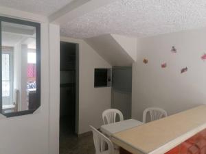 TV a/nebo společenská místnost v ubytování Bienvenido a tu segundo hogar a dos cuadras del centro recreaciónal lagos club comfatolima