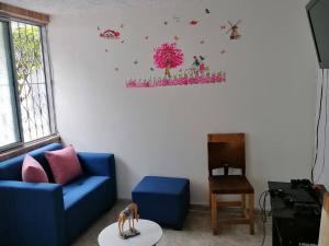 Posezení v ubytování Bienvenido a tu segundo hogar a dos cuadras del centro recreaciónal lagos club comfatolima