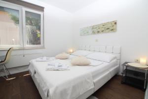 Posteľ alebo postele v izbe v ubytovaní Apartments Seccareccia
