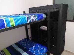 Postel nebo postele na pokoji v ubytování Bienvenido a tu segundo hogar a dos cuadras del centro recreaciónal lagos club comfatolima
