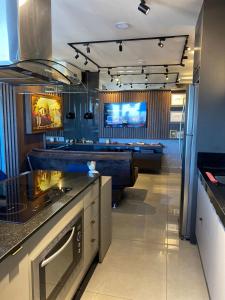 Køkken eller tekøkken på Vertigo Premium Studios - Luxo no 23º Andar