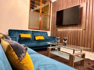 TV a/nebo společenská místnost v ubytování Casona Plaza Hotel Cusco