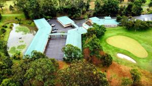 an overhead view of a golf course with a green at Golf Club Motor Inn Wingham in Wingham