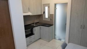 Kuchyň nebo kuchyňský kout v ubytování Constantine Fortezza Rooms