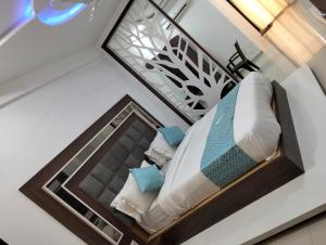 Letto o letti in una camera di Hotel Neptune Palace