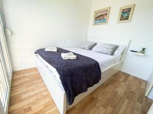 Posteľ alebo postele v izbe v ubytovaní RJ’s Apartment