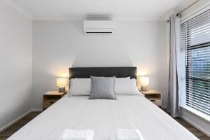 Ένα ή περισσότερα κρεβάτια σε δωμάτιο στο Merihaven