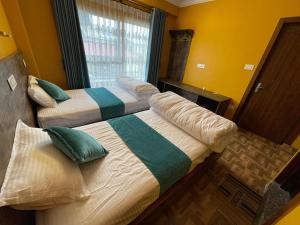 Postel nebo postele na pokoji v ubytování Munus Travel Home is "A Peaceful Home Away from the City"