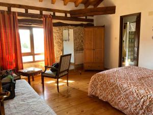 Llit o llits en una habitació de Don Baldomero Hotel Rural