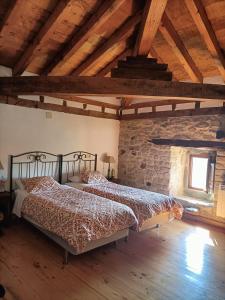 Postel nebo postele na pokoji v ubytování Don Baldomero Hotel Rural