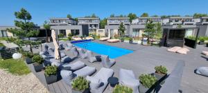 an image of a swimming pool at a resort at MANO JŪRA 2 SILVER in Palanga