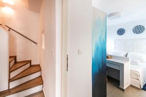A bed or beds in a room at The Old Court Council Luxury mansion by Ifigeneia