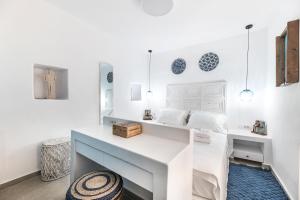 A bed or beds in a room at The Old Court Council Luxury mansion by Ifigeneia