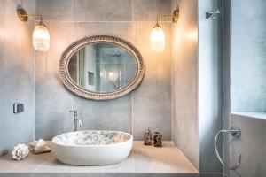 A bathroom at The Old Court Council Luxury mansion by Ifigeneia