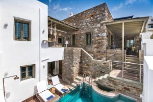 The swimming pool at or close to The Old Court Council Luxury mansion by Ifigeneia