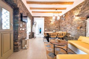A seating area at The Old Court Council Luxury mansion by Ifigeneia