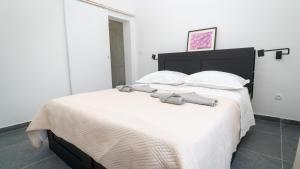 Posteľ alebo postele v izbe v ubytovaní Apartman A2 s vlastitim bazenom + 5 fotografií