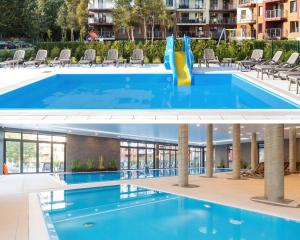 Bazén v ubytovaní Hello Polanki Aqua Park Premium alebo v jeho blízkosti