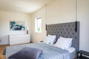 Postel nebo postele na pokoji v ubytování Visby Villas