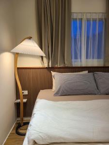Voodi või voodid majutusasutuse Good Day Homestay toas